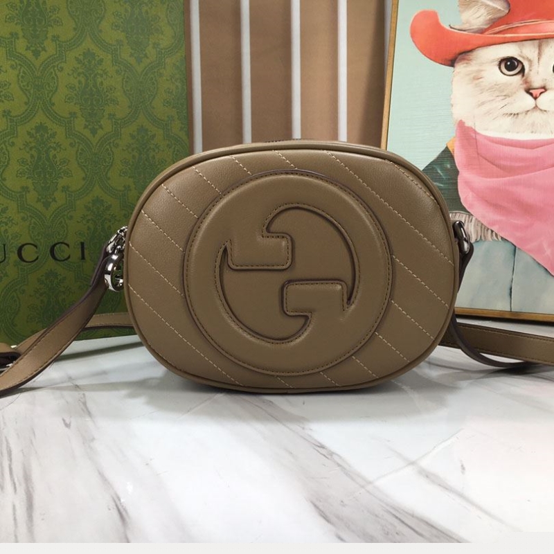 G*u*i satchel bags